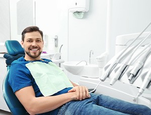 Woman with toothache at emergency dentist