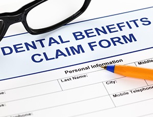 Dental insurance form on desk