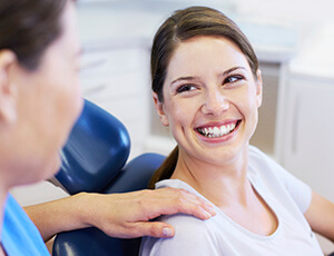 Laughing patient in dental chair