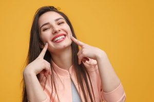 Woman smiling.